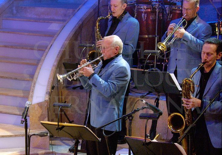 Ron Miscavige performing at a charity concert in the United Kingdom.